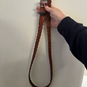 Onyx brown leather braided woven belt. Size 34. Some tarnishing on buckle.